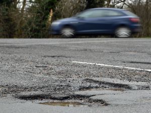 Supporting image for story: What should I do if my car is damaged by a pothole?