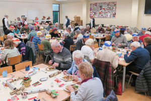 Senior citizens tucking into their dinners