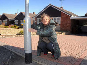 Supporting image for story: Anger over lamp post on driveway