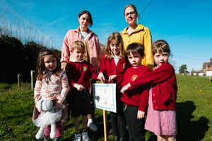 Children have made signs to slow traffic down in Longden