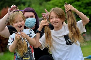 Jacob Kay and Cooper Kay after their haircuts with hairdresser Stacey Wheaver