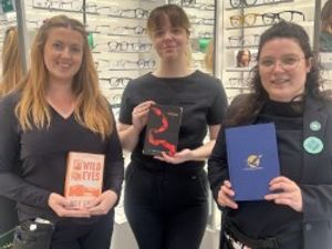 Supporting image for story: Optical team sets sights on charity reading challenge