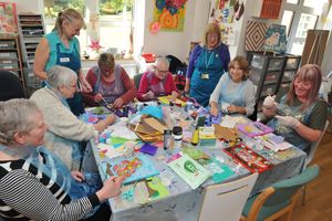 Sandra Owen, a creative therapist, leads sessions with visitors at one of the regular coffee mornings