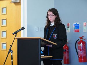 Tayla New reads a poem.