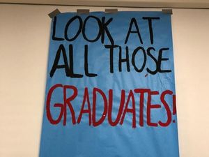 Supporting image for story: This student covered her school in graduation posters inspired by Vines
