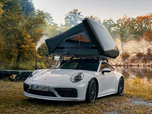 Supporting image for story: Porsche adds adventure focus to its cars with new roof tent