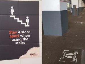 Supporting image for story: Railway station signs showing way to socially distance 