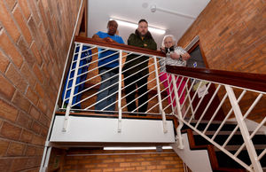 Residents Ephraim Henry and Noleean Dyke pictured with Councillor Garry Perry at Old Vicarage Close