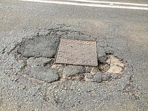 A damaged road on A458 near Stourton