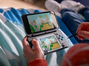Supporting image for story: The 2DS XL is Nintendo's new lightweight handheld console and its coming this summer