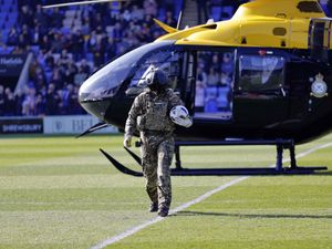 Supporting image for story: Watch as helicopter lands on pitch to deliver ball at Shrewsbury Town before heavy defeat on home turf