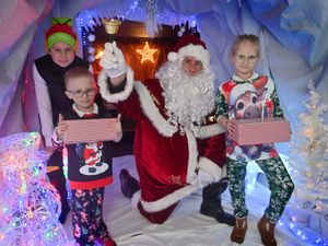 Supporting image for story: What Christmas is all about - youngsters get enjoy Santa visit thanks to 'magical' event