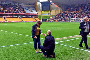 Les Roberts goes down on one knee at half time in 2014