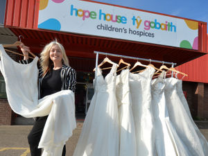 Supporting image for story: Wedding dress event at charity shop after dozens donated by bridal business