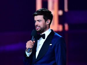 Jack Whitehall said touring with his parents could be emasculating, but was happy to have them with him