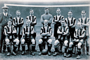 Joe Hodnett's - third from the left in the back row - daughter said her father was a 'very liked' man in the community 