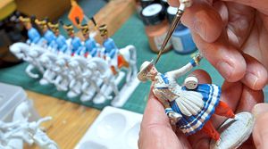 Detail being painted on a model