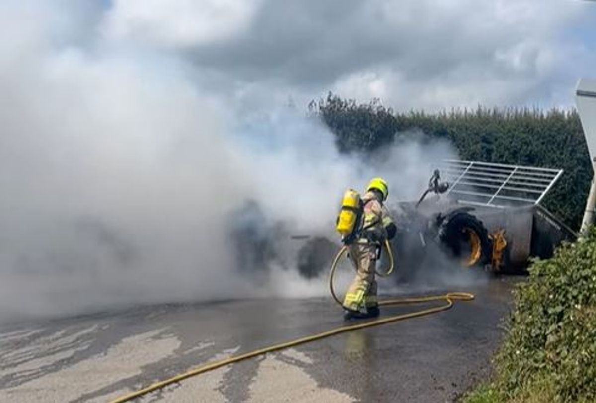 Watch: Fire crews tackle blaze involving JCB loader near Oswestry