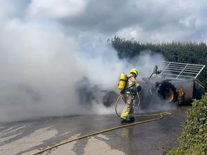 Supporting image for story: Watch: Fire crews tackle blaze involving JCB loader near Oswestry