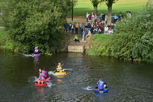 Coracle racing from above in Shrewsbury