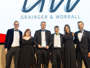 The Grainger & Worrall team collect their award 