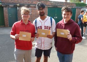 Students with their GCSE results at Haberdashers' Adams in Newport