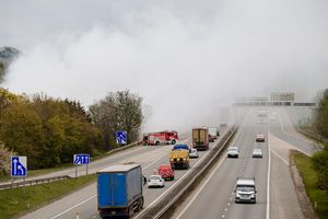 Smoke billows on to the M54 on the morning after the fire