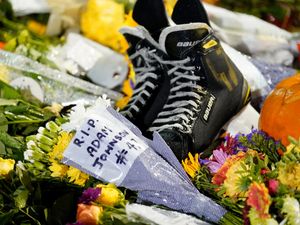 Floral tributes outside the Motorpoint Arena, Nottingham, ahead of a memorial for Nottingham Panthers’ ice hockey player Adam Johnson