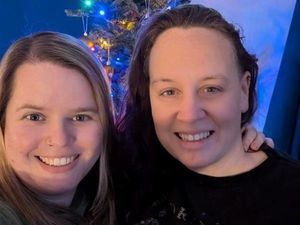 Jodie (right) with wife Holly (left) are celebrating their first Christmas as foster parents