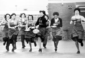 February 8, 1978: 'They're off, and running.' Those are only details on back of this print, apart from 'Frank F. Harrison School, Walsall,' but it is obviously a pancake race, clearly at the school.