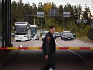 Supporting image for story: Military-aged men flee Russia after Putin orders partial mobilisation