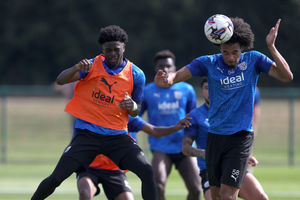 Josh Maja goes up for a header (Photo by Adam Fradgley/West Bromwich Albion FC via Getty Images).