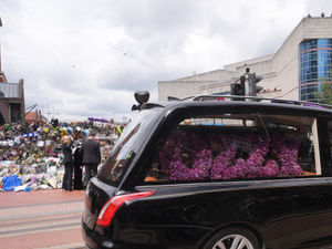 Supporting image for story: WATCH: Ozzy Osbourne procession: Hearse passes childhood home and stops on Black Sabbath bridge