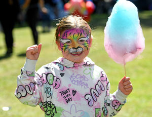 It's candy floss time for Luna Rubery, aged four.