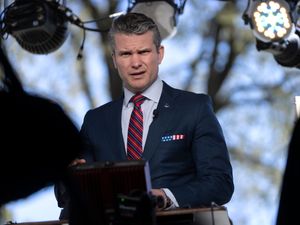 Defence secretary Pete Hegseth prepares to give a television interview outside the White House in Washington