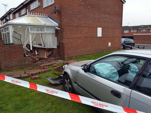 Supporting image for story: Car smashes into conservatory