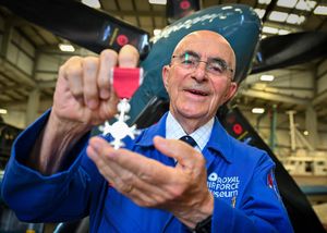 RAF Museum volunteer Roy Martin with his MBE. Photo: Bob Greaves Photography