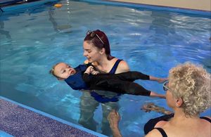 Theo enjoying his swim in the pool
