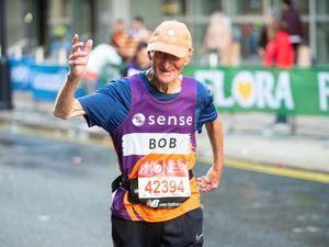 Bob Smith waving to the crowd during the London marathon