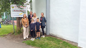 (L-R) Paige Eades, Gary Thomas, Kelly Lee, Pru Allison with children from St George’s Junior School
