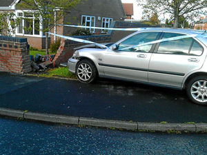 Supporting image for story: Rover wrecks wall on Newport Olympic torch route