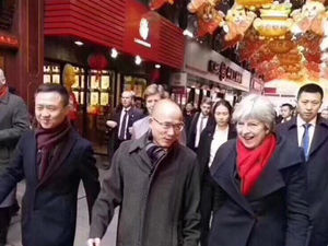 Supporting image for story: Looking forward to seeing us in the Premier League, Theresa? Wolves owner meets PM on China trip