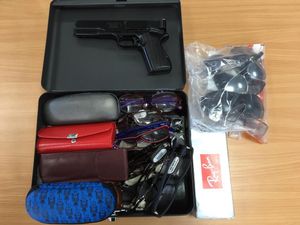 Supporting image for story: Woman arrested after fake gun and stolen glasses found in Telford police raid