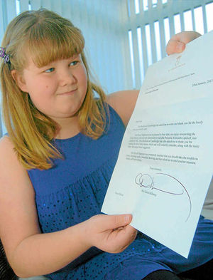 Faye Oliver, from Telford, with the reply she received from Kate Middleton