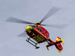 Supporting image for story: Man trapped under mower after it rolled down embankment airlifted to hospital