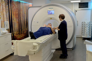 Mr Watson prepares for his scan with senior radiographer Jan Kennedy