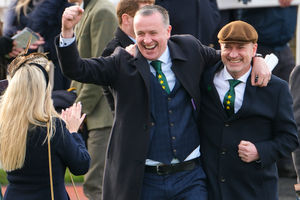 Connections of Stumptown celebrate as their horse Stumptown wins The Glenfarclas Cross Country Chase during Style Wednesday. (Photo by Alan Crowhurst/Getty Images)