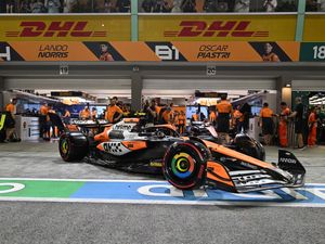 Supporting image for story: Lando Norris clinches Singapore pole ahead of title rival Max Verstappen
