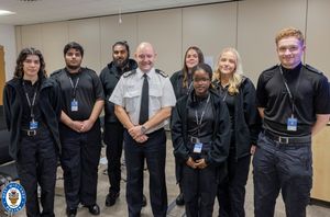 Lola (left) and Lucy (back) pose with the other apprentices and Chief Constable Craig Guildford