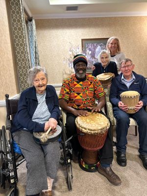 Supporting image for story: Hard to beat! Wolverhampton care home residents celebrate African culture with drumming workshop